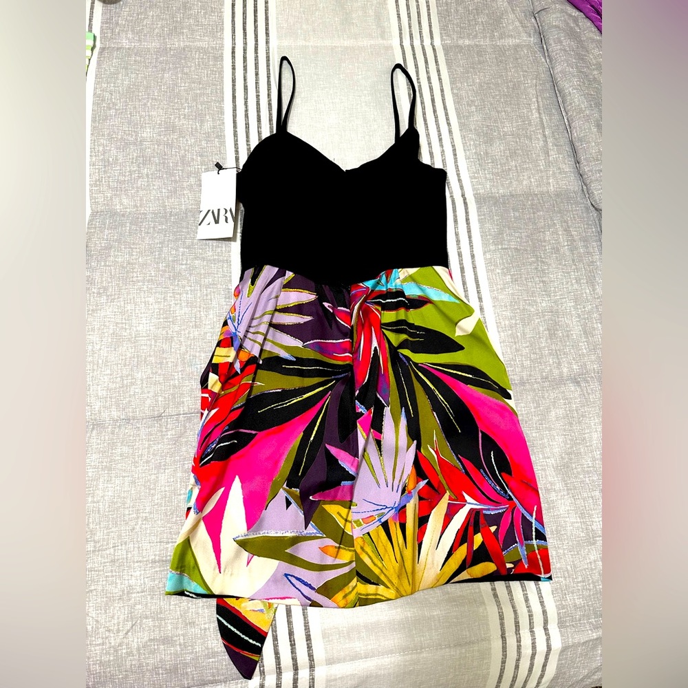 Zara black dress with printed skirt. Open cut on the back